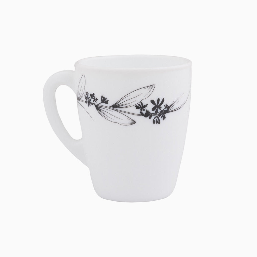 A set of white dinnerware with a floral pattern, including plates and bowls.