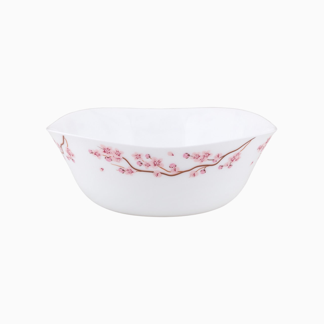 A set of white dinnerware with a pink floral pattern, including plates, bowls, and cups.