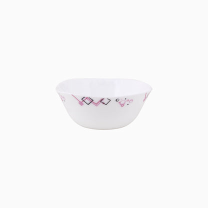 A set of white dinnerware with a geometric pattern in pink and purple, including dinner plates, dessert plates, soup plates, small bowls, and a platter.