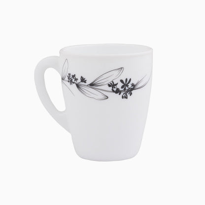 A set of white dinnerware with a floral pattern, including plates and bowls.
