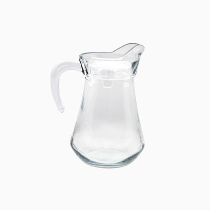 Clear glass pitcher on a white background