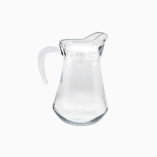 Clear glass pitcher on a white background