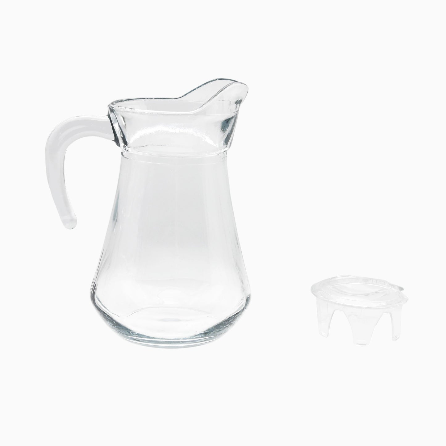 Clear glass pitcher with a small lid on a white background