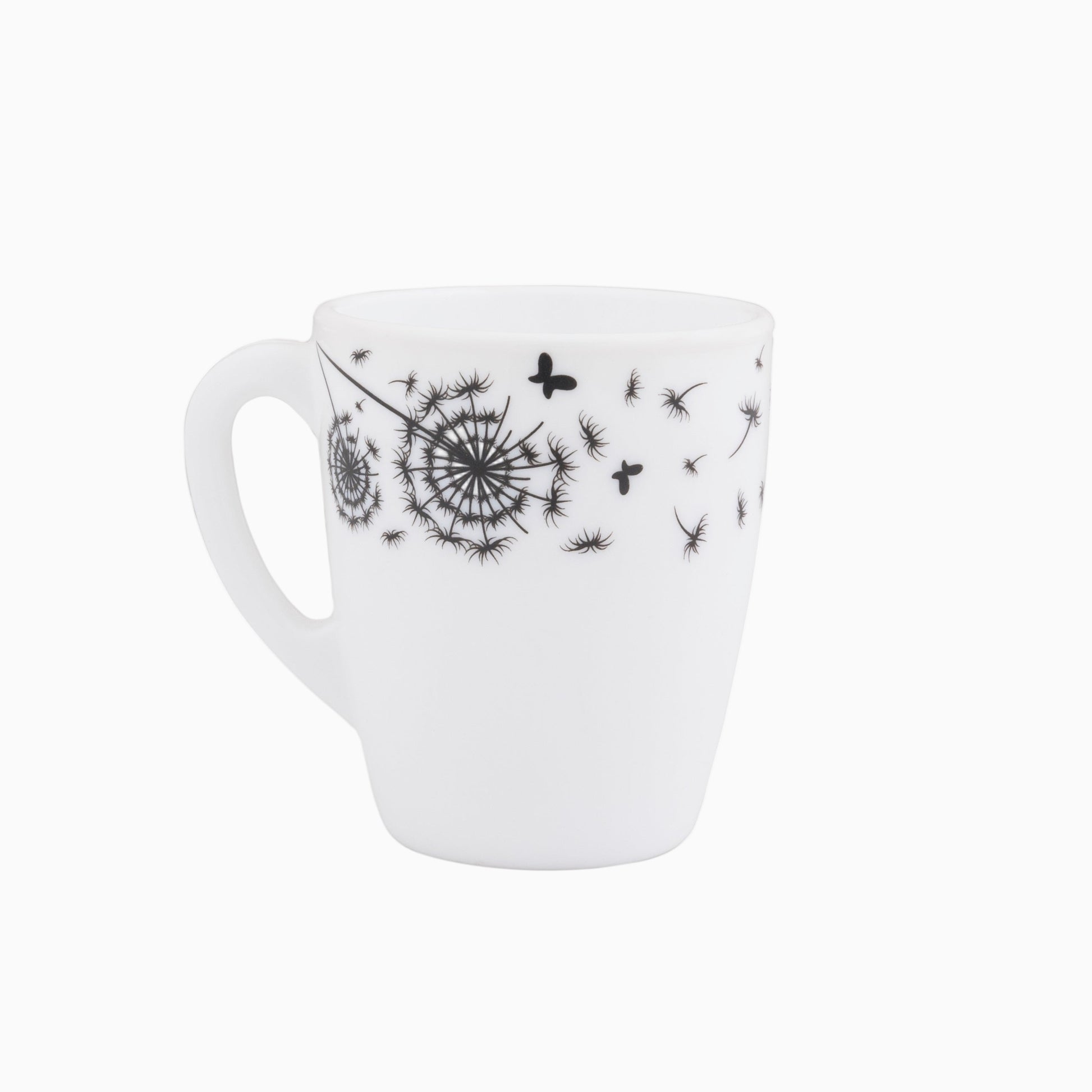 A set of white dinnerware with black floral patterns, including plates, bowls, and a platter dish.