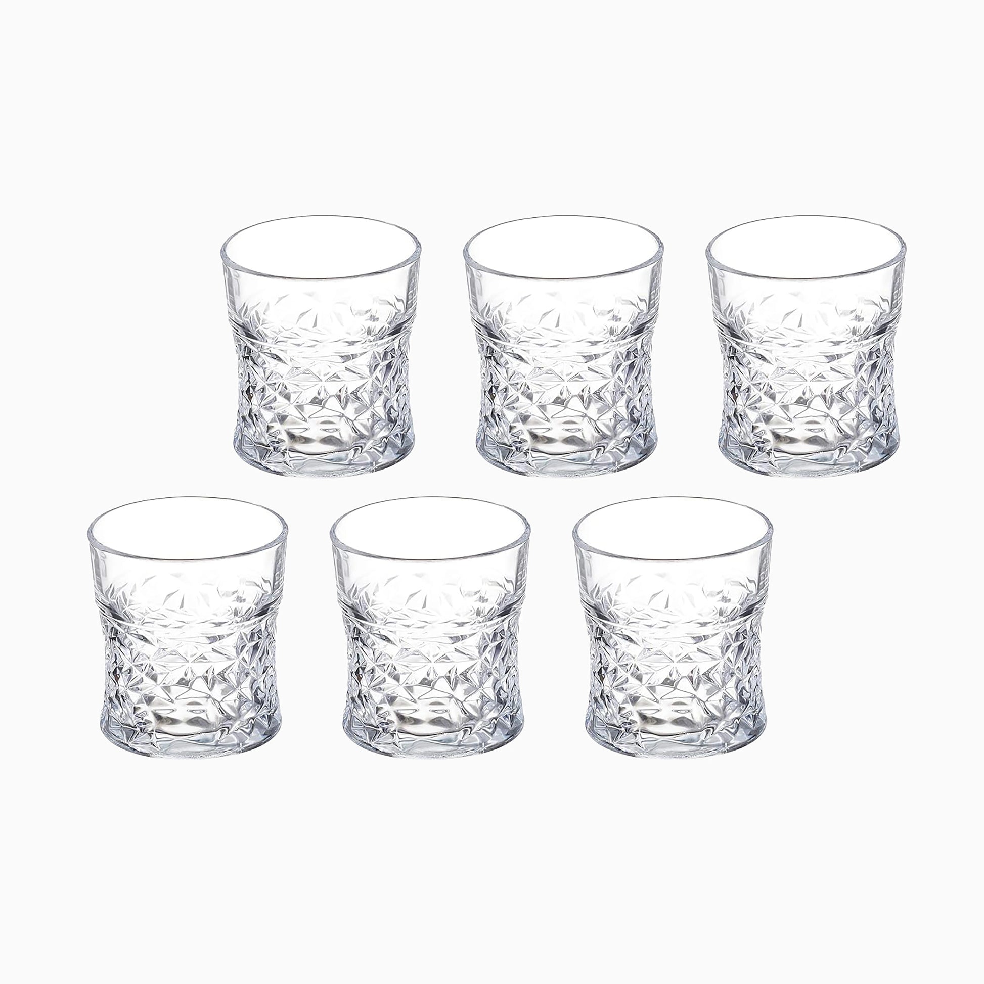Set of six clear glass tumblers with textured design