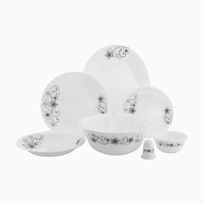 Set of white opal dishes with black floral patterns on a white background