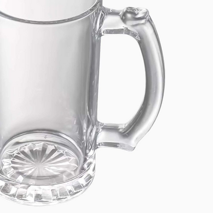 Clear glass mug with handle on a white background