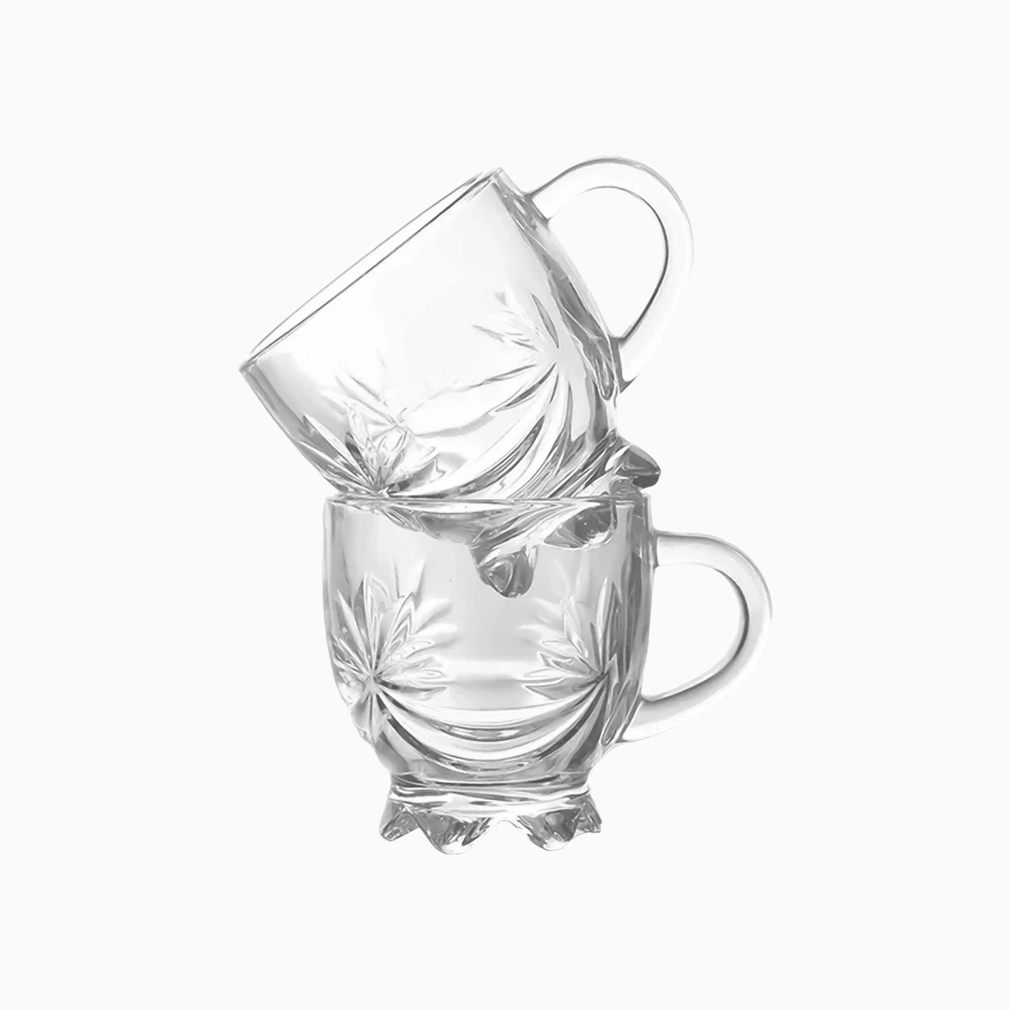 Two clear glass mugs stacked on a white background