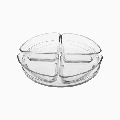 Clear glass dish with compartments on a white background