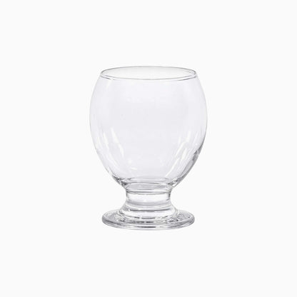 Clear glass goblet on a white background
