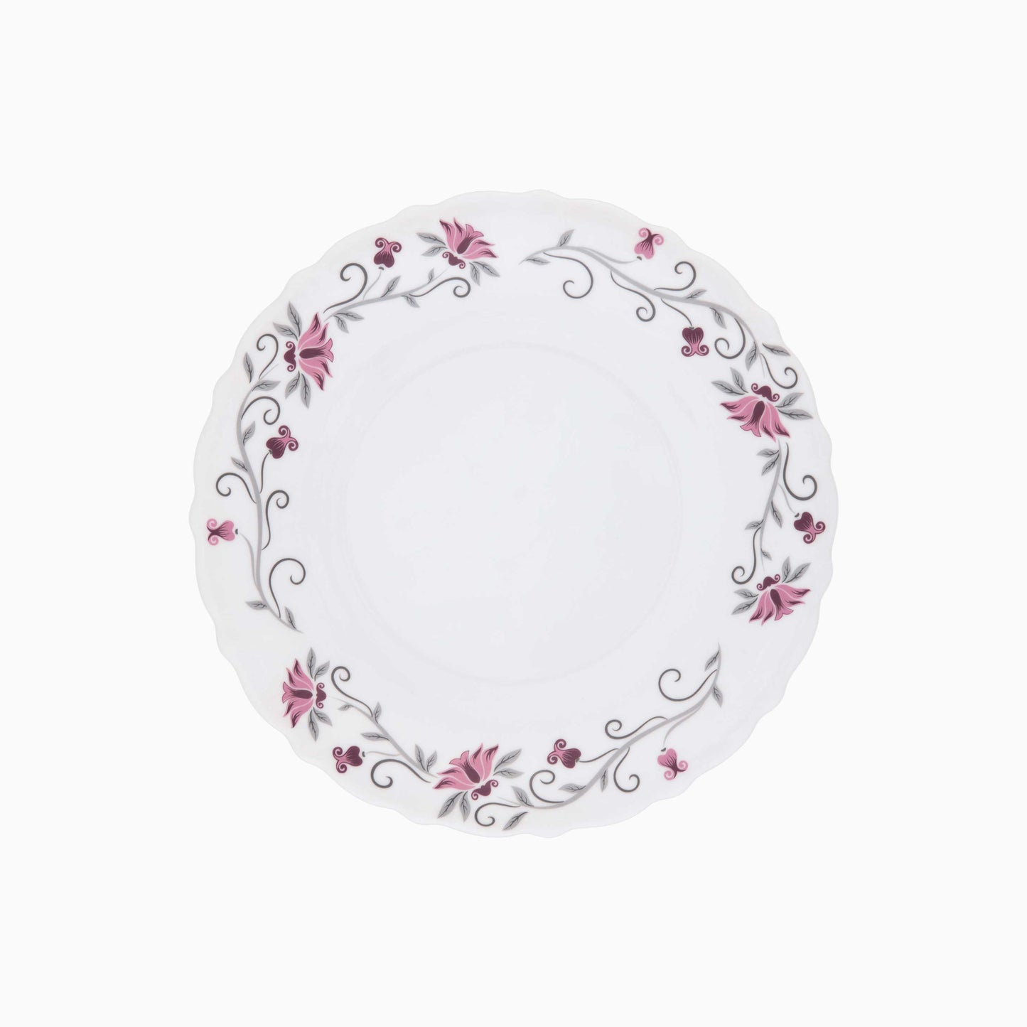 Round white plate with floral design on a white background