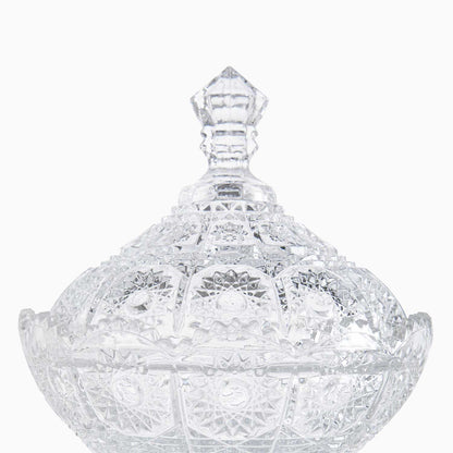 Clear glass candy bowl with intricate cut patterns