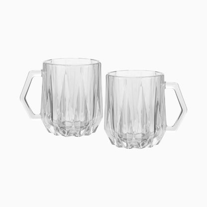Two clear glass mugs with handles on a white background