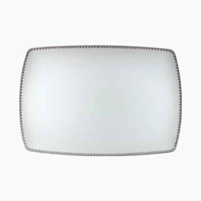 Rectangular white plate with decorative gray rim on a white background