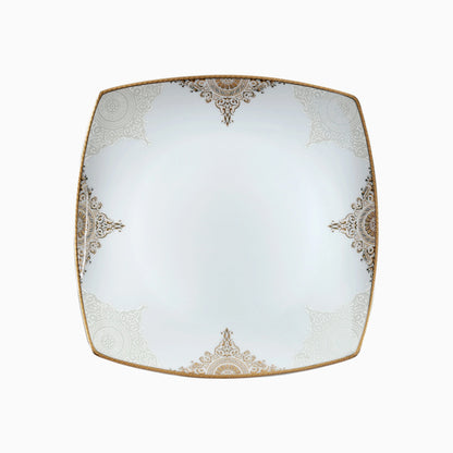 Decorative square plate with gold patterns on a white background