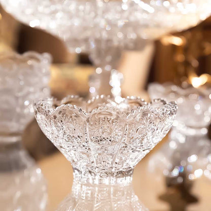 Decorative crystal bowl with intricate designs on a blurred background