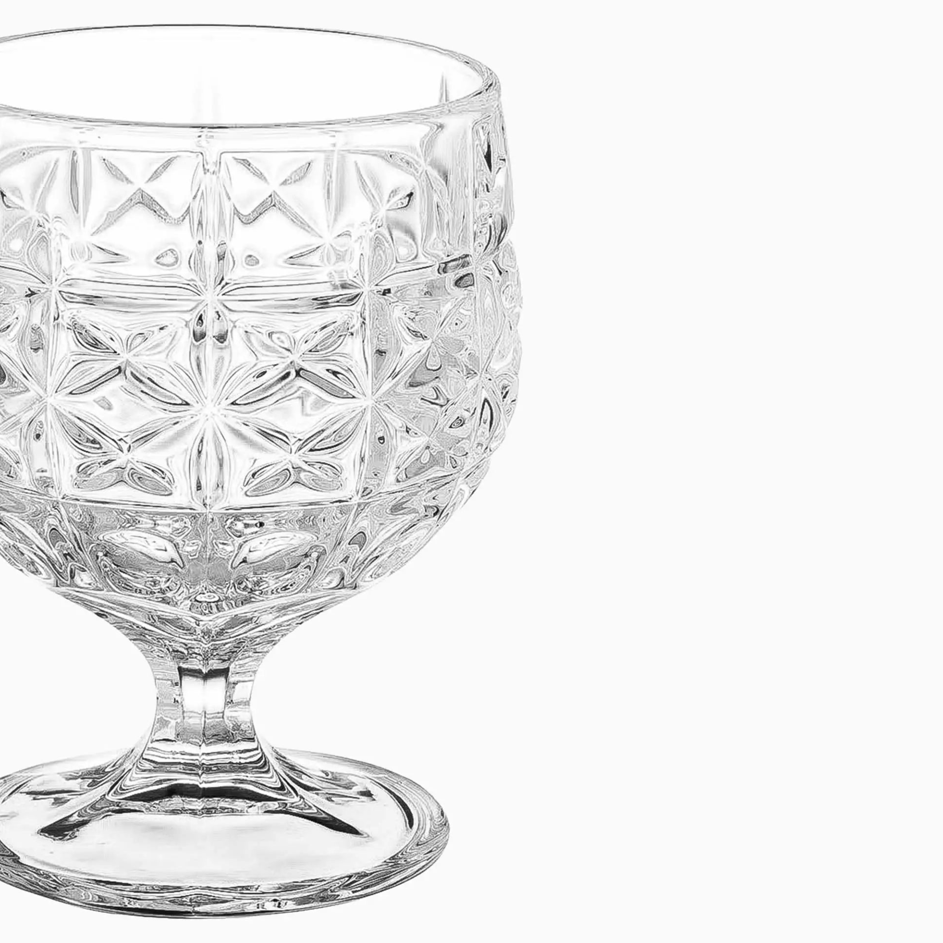 Clear glass with diamond cut pattern on a white background