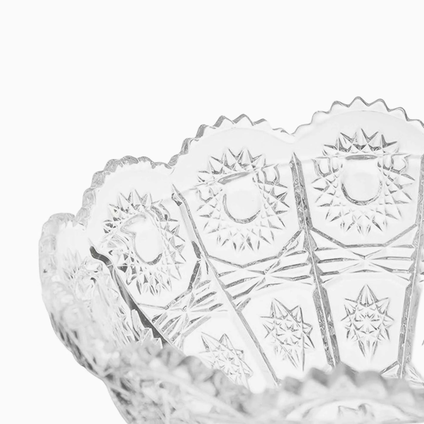 Clear glass bowl with intricate cut patterns