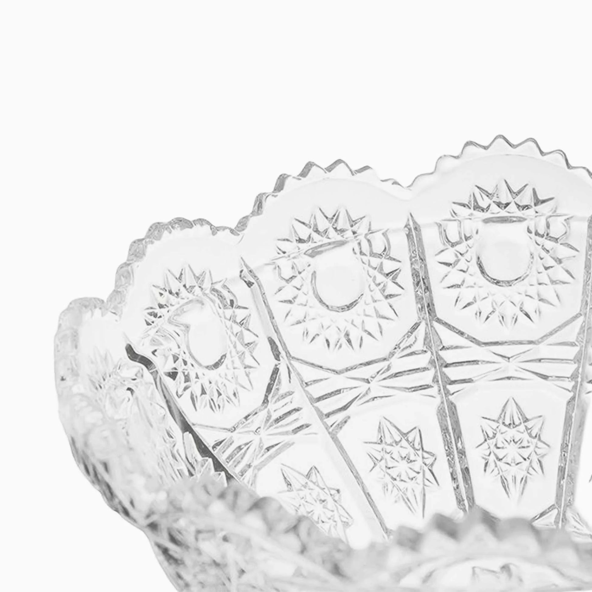 Clear glass bowl with intricate cut patterns