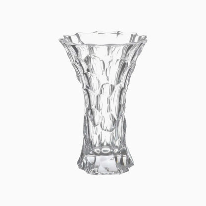 Clear glass vase with textured design on a white background