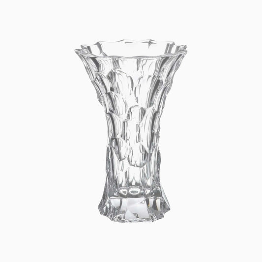 Clear glass vase with textured design on a white background