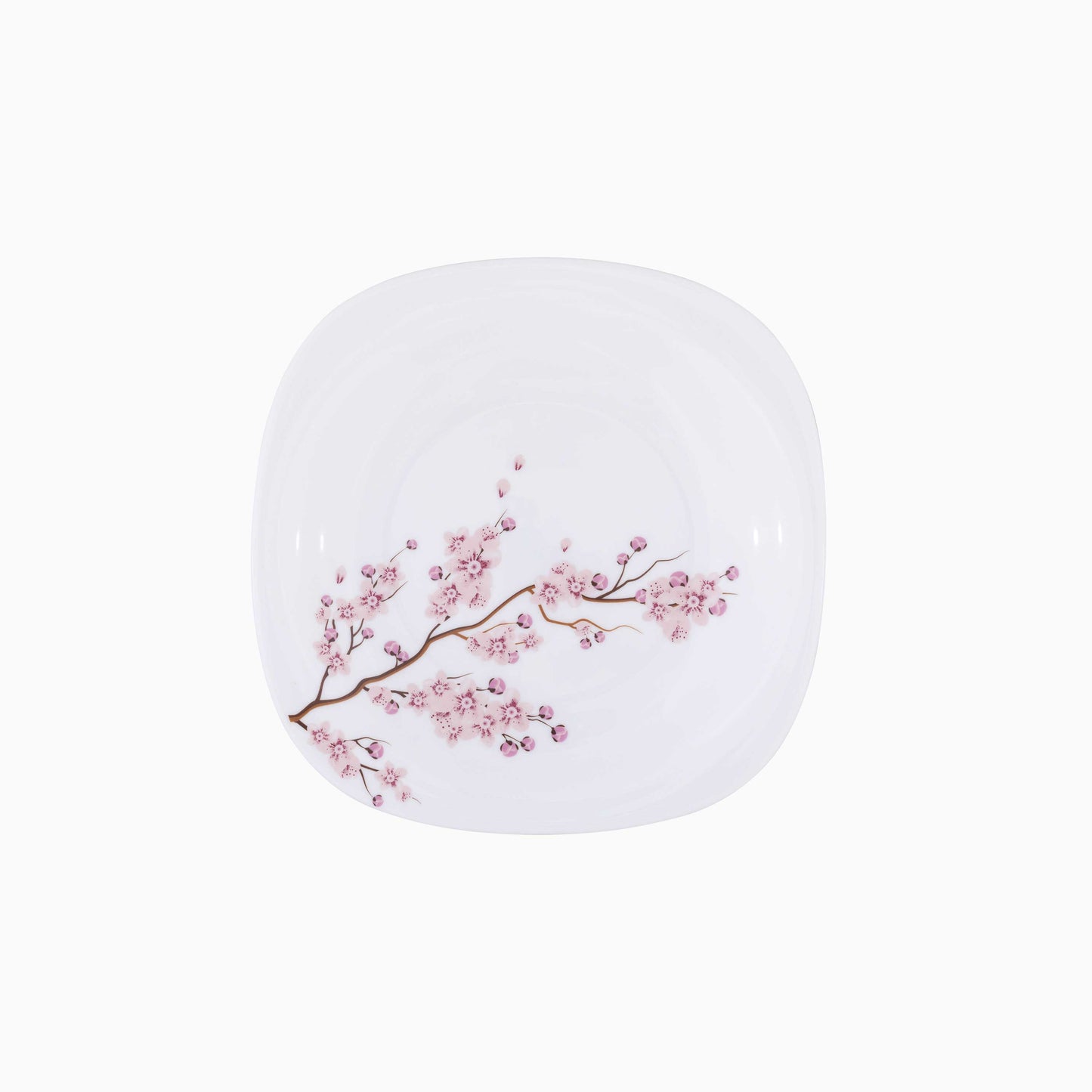 White dessert plate with pink floral design on a white background
